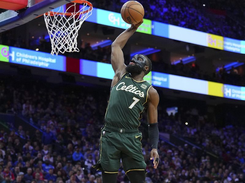 PHILADELPHIA, PA - FEBRUARY 25: Jaylen Brown #7 of the Boston Celtics dunks the ball against the Philadelphia 76ers at the Wells Fargo Center on February 25, 2023 in Philadelphia, Pennsylvania. The Celtics defeated the 76ers 110-107. NOTE TO USER: User expressly acknowledges and agrees that, by downloading and or using this photograph, User is consenting to the terms and conditions of the Getty Images License Agreement. (Photo by Mitchell Leff/Getty Images)