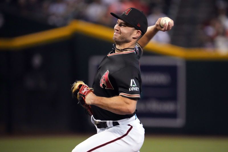 Oct 1, 2023; Phoenix, Arizona, USA; Arizona Diamondbacks relief pitcher Bryce Jarvis (40) pitches against the Houston Astros during the first inning at Chase Field. Mandatory Credit: Joe Camporeale-USA TODAY Sports