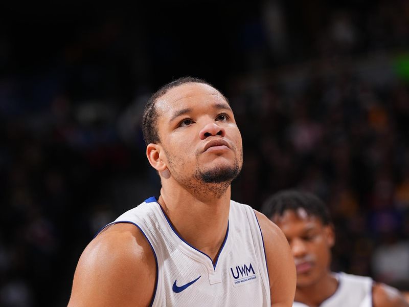 DENVER, CO - JANUARY 7: Kevin Knox II #24 of the Detroit Pistons shoots a free throw during the game against the Denver Nuggets on January 7, 2024 at the Ball Arena in Denver, Colorado. NOTE TO USER: User expressly acknowledges and agrees that, by downloading and/or using this Photograph, user is consenting to the terms and conditions of the Getty Images License Agreement. Mandatory Copyright Notice: Copyright 2024 NBAE (Photo by Bart Young/NBAE via Getty Images)