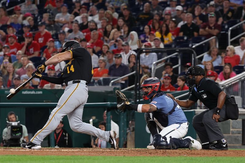 Sep 12, 2025; Washington, District of Columbia, USA; Pittsburgh Pirates catcher Joey Bart (14) hits an RBI double against the Washington Nationals during the ninth inning at Nationals Park. Mandatory Credit: Geoff Burke-Imagn Images