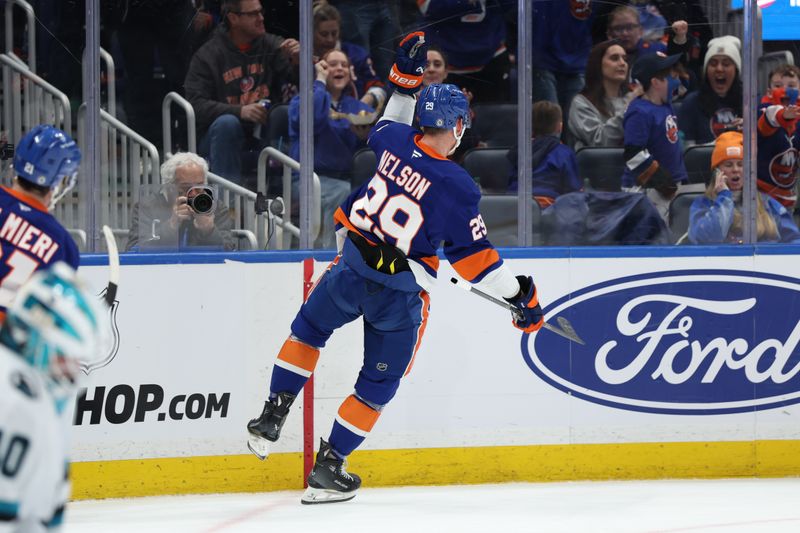 Jan 18, 2025; Elmont, New York, USA;  New York Islanders center Brock Nelson (29) celebrates his goal against the San Jose Sharks during the second period at UBS Arena. Mandatory Credit: Thomas Salus-Imagn Images