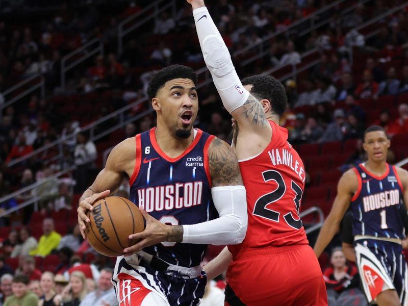 HOUSTON, TEXAS - FEBRUARY 03: Kenyon Martin Jr. #6 of the Houston Rockets drives ahead of Fred VanVleet #23 of the Toronto Raptors during the first half at Toyota Center on February 03, 2023 in Houston, Texas. NOTE TO USER: User expressly acknowledges and agrees that, by downloading and or using this photograph, User is consenting to the terms and conditions of the Getty Images License Agreement. (Photo by Carmen Mandato/Getty Images)