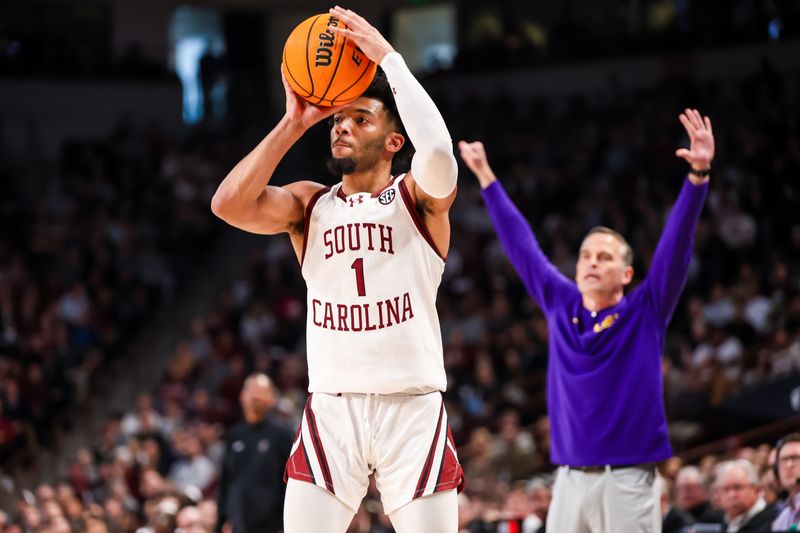 Feb 17, 2024; Columbia, South Carolina, USA; South Carolina Gamecocks guard Jacobi Wright (1) makes a three point basket against the LSU Tigers in the first half at Colonial Life Arena. Mandatory Credit: Jeff Blake-USA TODAY Sports