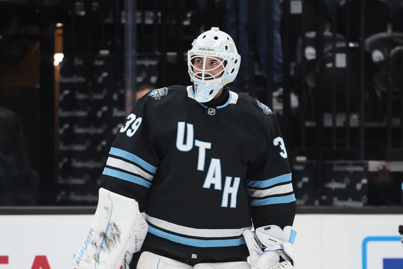 Oct 22, 2024; Salt Lake City, Utah, USA; Utah Hockey Club goaltender Connor Ingram (39) warms up before a game against the Ottawa Senators at Delta Center. Mandatory Credit: Rob Gray-Imagn Images