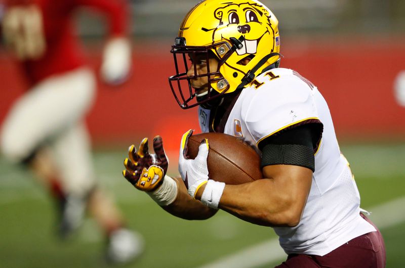 Oct 19, 2019; Piscataway, NJ, USA; Minnesota Golden Gophers defensive back Antoine Winfield Jr. (11) scores a touchdown after an interception against the Rutgers Scarlet Knights during the second half at SHI Stadium. Mandatory Credit: Noah K. Murray-USA TODAY Sports