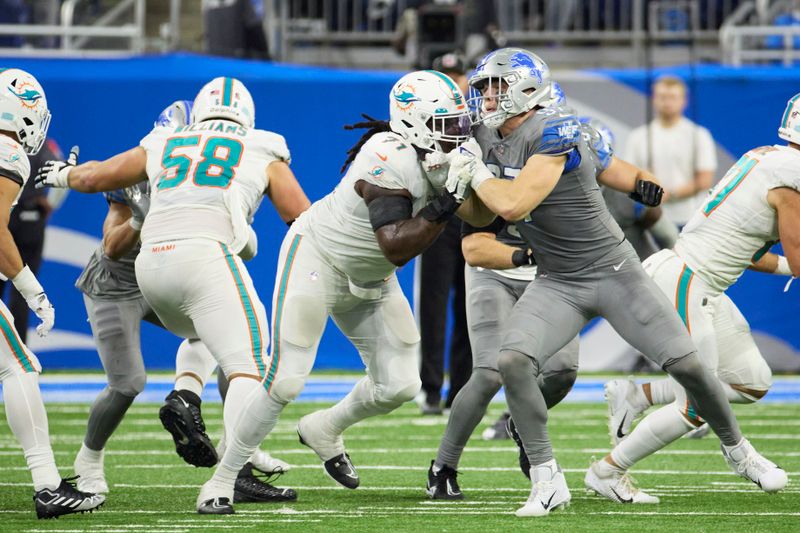 Miami Dolphins offensive lineman Brandon Shell (71) blocks Detroit Lions defensive end Aidan Hutchinson (97) during an NFL football game, Sunday, Oct. 30, 2022, in Detroit. (AP Photo/Rick Osentoski)