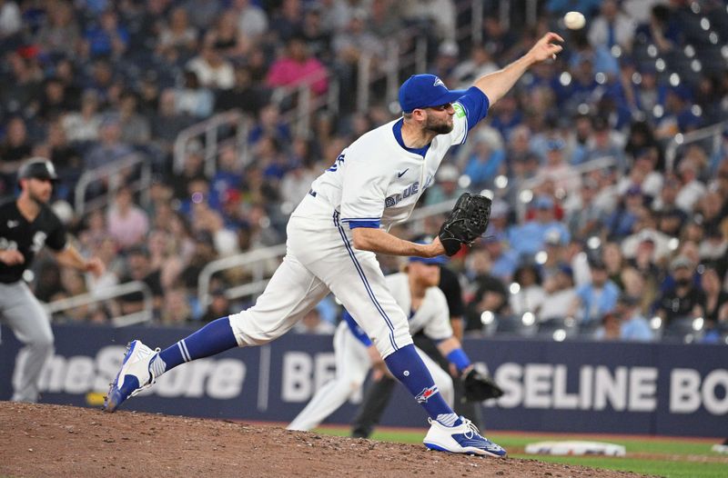 May 21, 2024; Toronto, Ontario, CAN;   Toronto Blue Jays relief pitcher Tim Mayza (58) delivers a pitch against the Chicago White Sox in the eighth inning at Rogers Centre. Mandatory Credit: Dan Hamilton-USA TODAY Sports