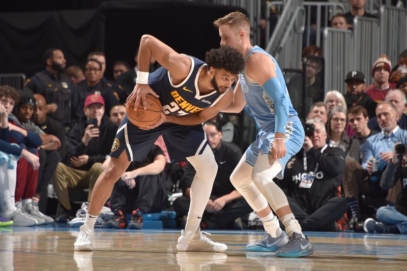 CLEVELAND, OH - DECEMBER 8: Jamal Murray #27 of the Denver Nuggets dribbles the ball during the game against the Cleveland Cavaliers on December 5, 2024 at Rocket Mortgage FieldHouse in Cleveland, Ohio. NOTE TO USER: User expressly acknowledges and agrees that, by downloading and/or using this Photograph, user is consenting to the terms and conditions of the Getty Images License Agreement. Mandatory Copyright Notice: Copyright 2024 NBAE (Photo by David Liam Kyle/NBAE via Getty Images)