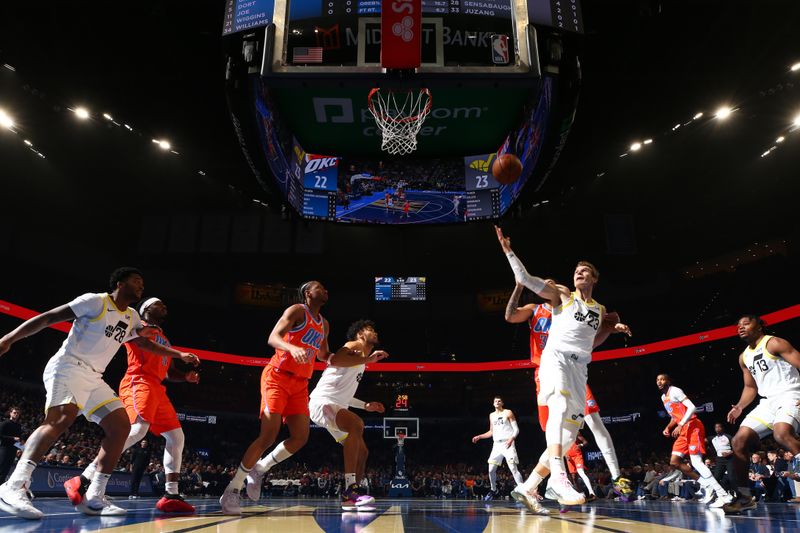 OKLAHOMA CITY, OK - DECEMBER 3: Lauri Markkanen #23 of the Utah Jazz goes up for the rebound during the game against the Oklahoma City Thunder during the Emirates NBA Cup game on on December 3, 2024 at Paycom Center in Oklahoma City, Oklahoma. NOTE TO USER: User expressly acknowledges and agrees that, by downloading and or using this photograph, User is consenting to the terms and conditions of the Getty Images License Agreement. Mandatory Copyright Notice: Copyright 2024 NBAE (Photo by Zach Beeker/NBAE via Getty Images)