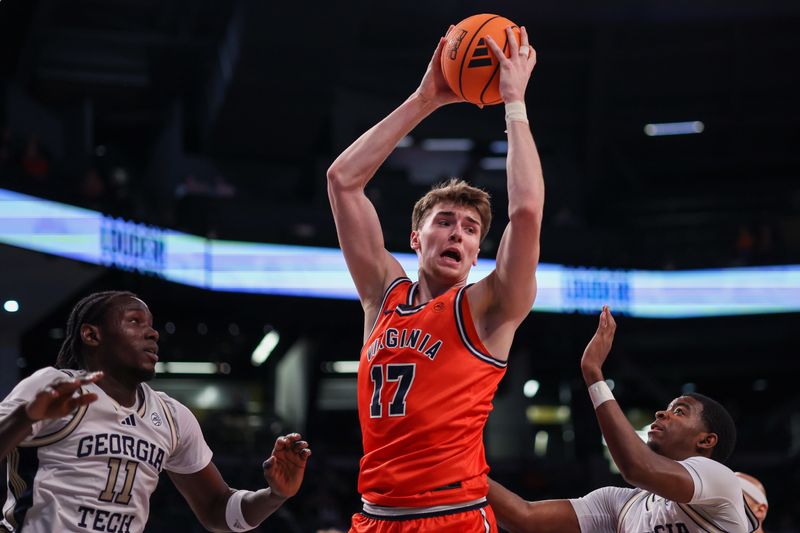Feb 18, 2026; Atlanta, Georgia, USA; Virginia Cavaliers center Johann Gruenloh (17) grabs a rebound against the Georgia Tech Yellow Jackets in the first half at McCamish Pavilion. Mandatory Credit: Brett Davis-Imagn Images