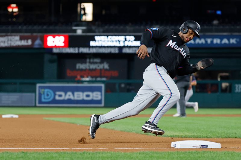 Sep 12, 2024; Washington, District of Columbia, USA; Miami Marlins shortstop Xavier Edwards (63) rounds third base en route to scoring a run on an RBI single by Marlins first baseman Jonah Bride (not pictured) against the Washington Nationals during the eighth inning at Nationals Park. Mandatory Credit: Geoff Burke-Imagn Images