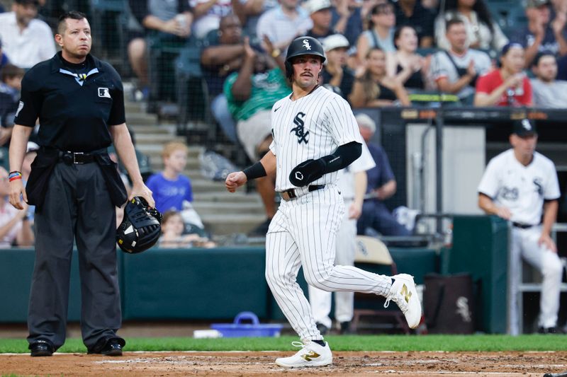 Aug 24, 2024; Chicago, Illinois, USA; Chicago White Sox outfielder Dominic Fletcher (7) scores against the Detroit Tigers during the third inning at Guaranteed Rate Field. Mandatory Credit: Kamil Krzaczynski-USA TODAY Sports