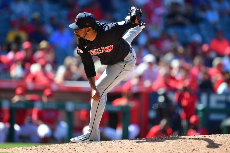 May 26, 2024; Anaheim, California, USA; Cleveland Guardians pitcher Emmanuel Clase (48) throws against the Los Angeles Angels during the ninth inning at Angel Stadium. Mandatory Credit: Gary A. Vasquez-USA TODAY Sports