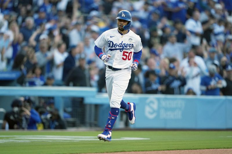 Jun 2, 2023; Los Angeles, California, USA; Los Angeles Dodgers right fielder Mookie Betts (50) rounds the bases after hitting a home run in the first inning against the New York Yankees at Dodger Stadium. Mandatory Credit: Kirby Lee-USA TODAY Sports