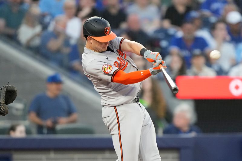 Jun 4, 2024; Toronto, Ontario, CAN; Baltimore Orioles first baseman Ryan Mountcastle (6) hits his second home run of the game against the Toronto Blue Jays during the fifth inning at Rogers Centre. Mandatory Credit: John E. Sokolowski-USA TODAY Sports