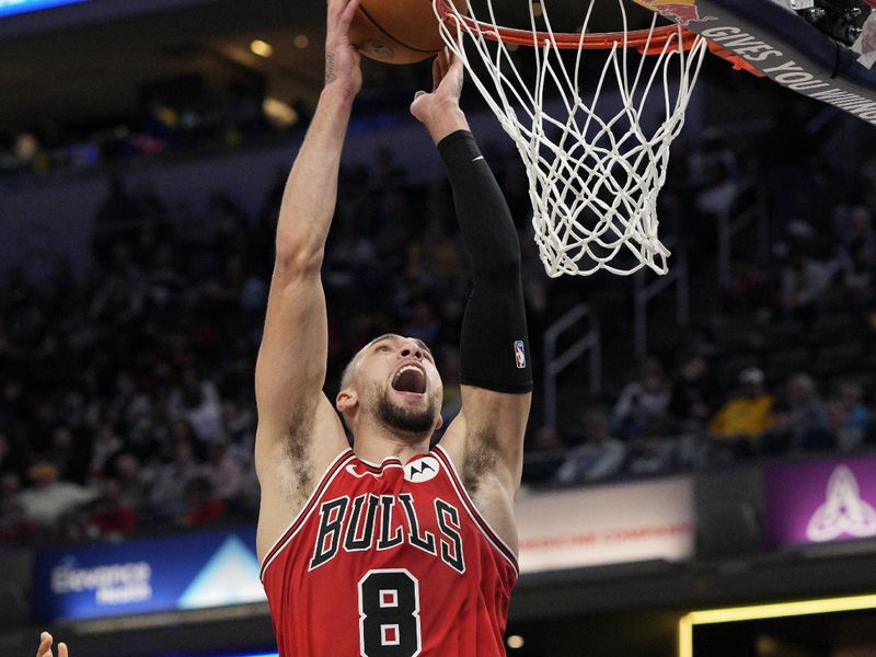 INDIANAPOLIS, INDIANA - JANUARY 08: Zach LaVine #8 of the Chicago Bulls dunks against Bennedict Mathurin #00 of the Indiana Pacers during the second half of an NBA basketball game at Gainbridge Fieldhouse on January 08, 2025 in Indianapolis, Indiana. NOTE TO USER: User expressly acknowledges and agrees that, by downloading and or using this Photograph, user is consenting to the terms and conditions of the Getty Images License Agreement. (Photo by Jeff Dean/Getty Images)