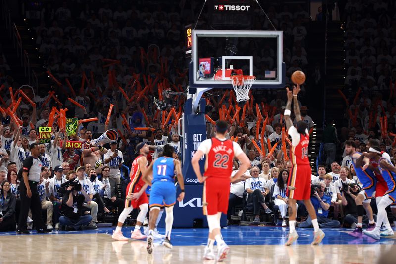 OKLAHOMA CITY, OKLAHOMA - APRIL 24:  Oklahoma City Thunder fans try to distract Brandon Ingram #14 of the New Orleans Pelicans while shooting a free throw during game two of the first round of the NBA playoffs at Paycom Center on April 24, 2024 in Oklahoma City, Oklahoma. (Photo by Jamie Squire/Getty Images)