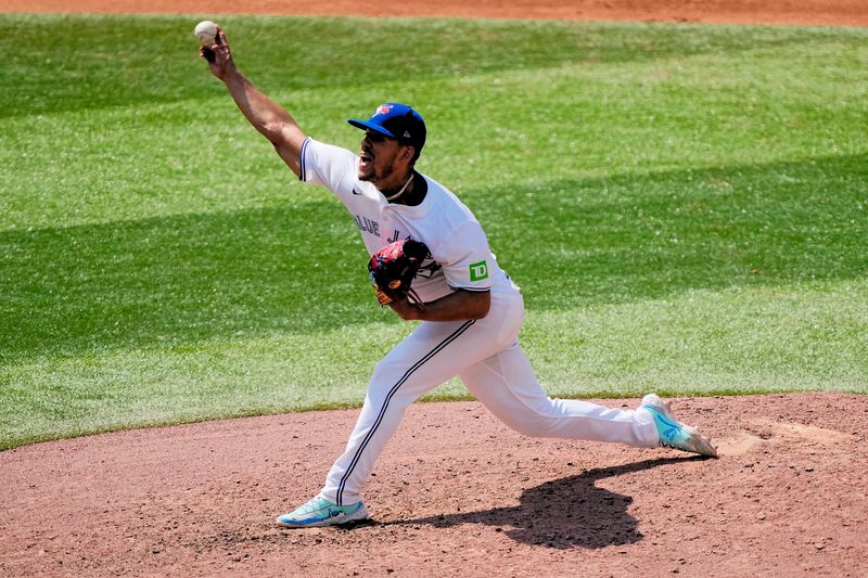 Jul 28, 2024; Toronto, Ontario, CAN; Toronto Blue Jays starting pitcher Jose Berrios (17) pitches to the Texas Rangers during the sixth inning at Rogers Centre. Mandatory Credit: John E. Sokolowski-USA TODAY Sports