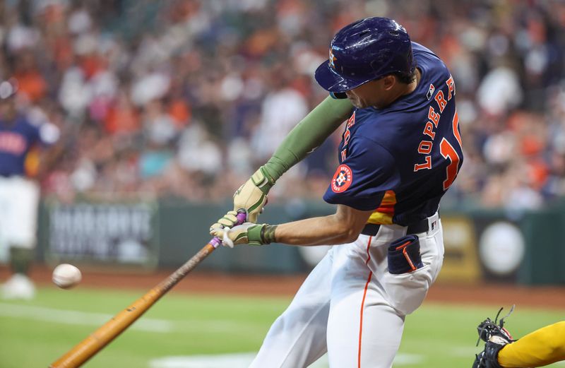 May 19, 2024; Houston, Texas, USA; Houston Astros left fielder Joey Loperfido (10) hits a single during the second inning against the Milwaukee Brewers at Minute Maid Park. Mandatory Credit: Troy Taormina-USA TODAY Sports