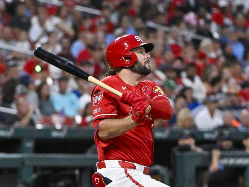 Aug 7, 2024; St. Louis, Missouri, USA;  St. Louis Cardinals first baseman Alec Burleson (41) hits a two run double against the Tampa Bay Rays during the fourth inning at Busch Stadium. Mandatory Credit: Jeff Curry-USA TODAY Sports