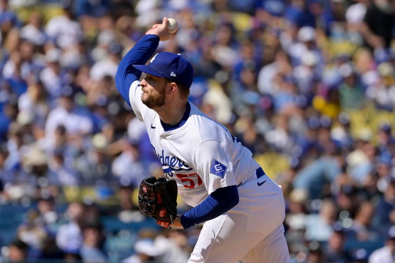 Oct 14, 2024; Los Angeles, California, USA; Los Angeles Dodgers pitcher Ryan Brasier (57) pitches in the first inning against the New York Mets during game two of the NLCS for the 2024 MLB Playoffs at Dodger Stadium. Mandatory Credit: Jayne Kamin-Oncea-Imagn Images