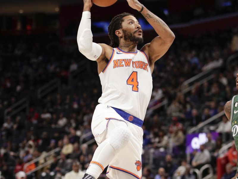 DETROIT, MI - NOVEMBER 29:  Derrick Rose #4 of the New York Knicks drives to the basket during the game against the Detroit Pistons on November 29, 2022 at Little Caesars Arena in Detroit, Michigan. NOTE TO USER: User expressly acknowledges and agrees that, by downloading and/or using this photograph, User is consenting to the terms and conditions of the Getty Images License Agreement. Mandatory Copyright Notice: Copyright 2022 NBAE (Photo by Brian Sevald/NBAE via Getty Images)