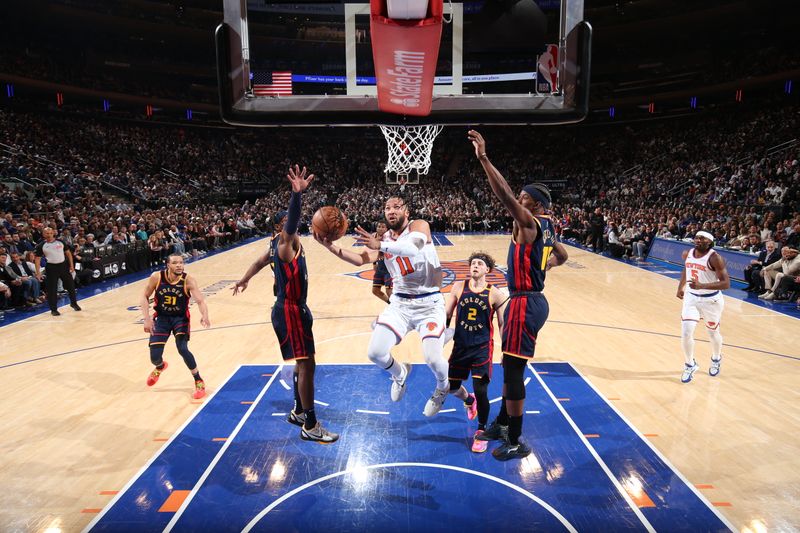 NEW YORK, NY - MARCH 4: Jalen Brunson #11 of the New York Knicks drives to the basket during the game against the Golden State Warriors on March 4, 2025 at Madison Square Garden in New York City, New York.  NOTE TO USER: User expressly acknowledges and agrees that, by downloading and or using this photograph, User is consenting to the terms and conditions of the Getty Images License Agreement. Mandatory Copyright Notice: Copyright 2025 NBAE  (Photo by Nathaniel S. Butler/NBAE via Getty Images)