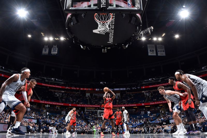 ORLANDO, FL - MARCH 2: Jonathan Mogbo #2 of the Toronto Raptors shoots a free throw during the game against the Orlando Magic on March 2, 2025 at Kia Center in Orlando, Florida. NOTE TO USER: User expressly acknowledges and agrees that, by downloading and or using this photograph, User is consenting to the terms and conditions of the Getty Images License Agreement. Mandatory Copyright Notice: Copyright 2025 NBAE (Photo by Fernando Medina/NBAE via Getty Images)