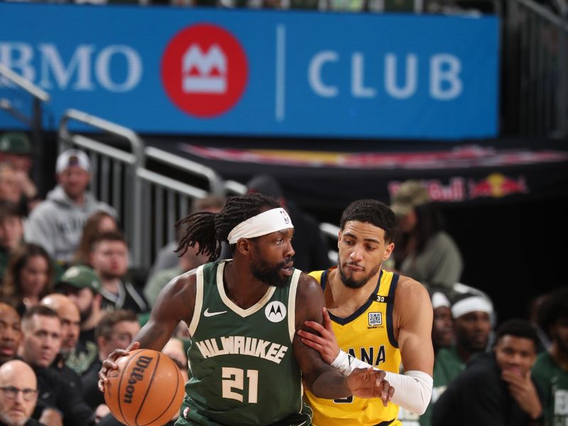 MILWAUKEE, WI - APRIL 21: Patrick Beverley #21 of the Milwaukee Bucks dribbles the ball during the game against the Indiana Pacers during Round 1 Game 1 of the 2024 NBA Playoffs on April 21, 2024 at the Fiserv Forum Center in Milwaukee, Wisconsin. NOTE TO USER: User expressly acknowledges and agrees that, by downloading and or using this Photograph, user is consenting to the terms and conditions of the Getty Images License Agreement. Mandatory Copyright Notice: Copyright 2024 NBAE (Photo by Gary Dineen/NBAE via Getty Images).