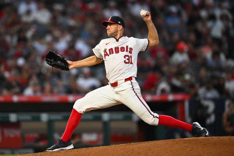 Jul 27, 2024; Anaheim, California, USA; Los Angeles Angels pitcher Tyler Anderson (31) throws a pitch against the Oakland Athletics during the sixth inning at Angel Stadium. Mandatory Credit: Jonathan Hui-USA TODAY Sports