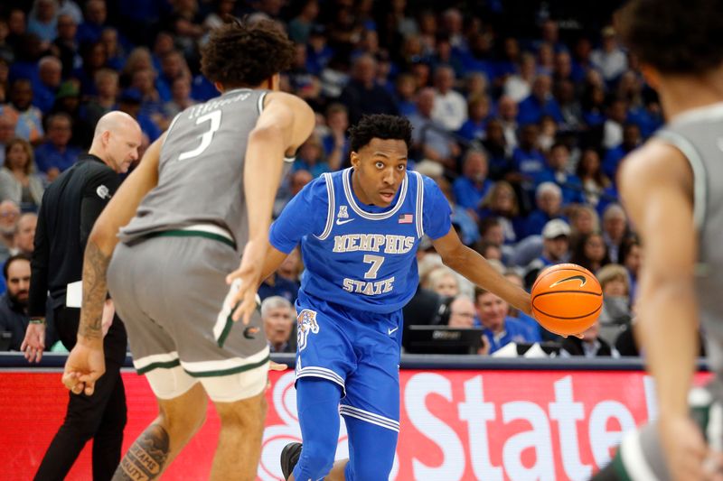 Mar 3, 2024; Memphis, Tennessee, USA; Memphis Tigers forward Nae'Qwan Tomlin (7) dribbles during the first half against the UAB Blazers at FedExForum. Mandatory Credit: Petre Thomas-USA TODAY Sports