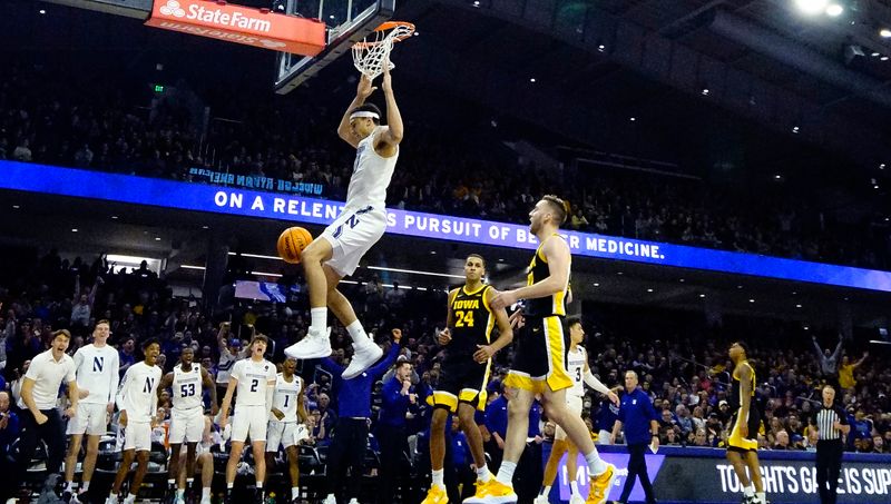 Feb 19, 2023; Evanston, Illinois, USA; Northwestern Wildcats forward Tydus Verhoeven (10) dunks the ball against the Iowa Hawkeyes during the second half at Welsh-Ryan Arena. Mandatory Credit: David Banks-USA TODAY Sports