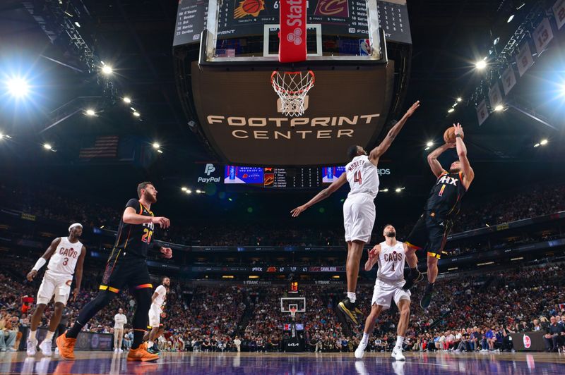 PHOENIX, AZ - APRIL  3: Devin Booker #1 of the Phoenix Suns shoots the ball during the game against the Cleveland Cavaliers on April 3, 2024 at Footprint Center in Phoenix, Arizona. NOTE TO USER: User expressly acknowledges and agrees that, by downloading and or using this photograph, user is consenting to the terms and conditions of the Getty Images License Agreement. Mandatory Copyright Notice: Copyright 2024 NBAE (Photo by Kate Frese/NBAE via Getty Images)