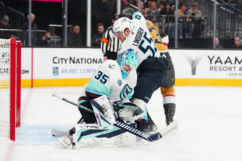 Jan 31, 2026; Las Vegas, Nevada, USA; Seattle Kraken goaltender Joey Daccord (35) makes a save against the Vegas Golden Knights during the first period at T-Mobile Arena. Mandatory Credit: Stephen R. Sylvanie-Imagn Images