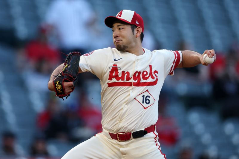May 7, 2025; Anaheim, California, USA;  Los Angeles Angels starting pitcher Yusei Kikuchi (16) pitches during the first inning against the Toronto Blue Jays at Angel Stadium. Mandatory Credit: Kiyoshi Mio-Imagn Images