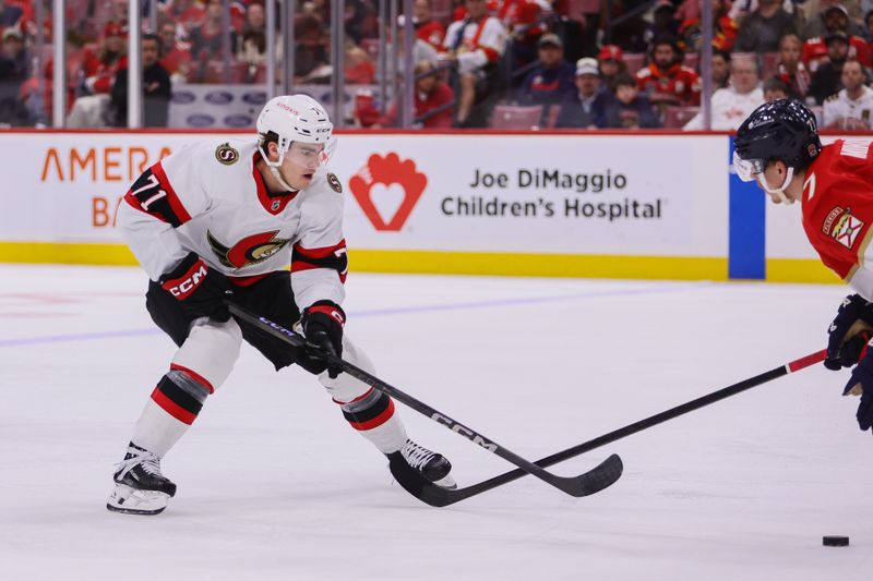 Apr 9, 2024; Sunrise, Florida, USA; Ottawa Senators center Ridly Greig (71) moves the puck against the Florida Panthers during the second period at Amerant Bank Arena. Mandatory Credit: Sam Navarro-USA TODAY Sports