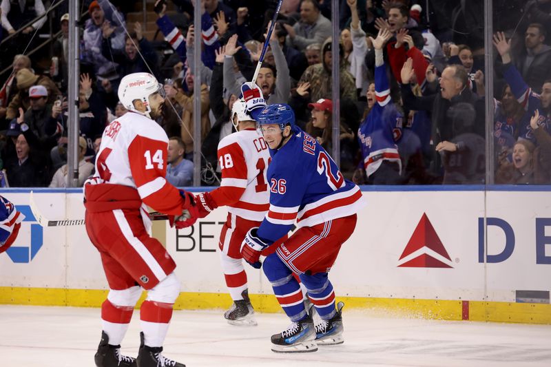 Nov 29, 2023; New York, New York, USA; New York Rangers left wing Jimmy Vesey (26) celebrates his game winning goal in front of Detroit Red Wings center Robby Fabbri (14) and center Andrew Copp (18) during the third period at Madison Square Garden. Mandatory Credit: Brad Penner-USA TODAY Sports