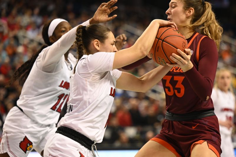 Mar 5, 2023; Greensboro, NC, USA; Louisville Cardinals guard Mykasa Robinson (5) and Virginia Tech Hokies center Elizabeth Kitley (33) battle for a rebound during the second half at Greensboro Coliseum. Mandatory Credit: William Howard-USA TODAY Sports