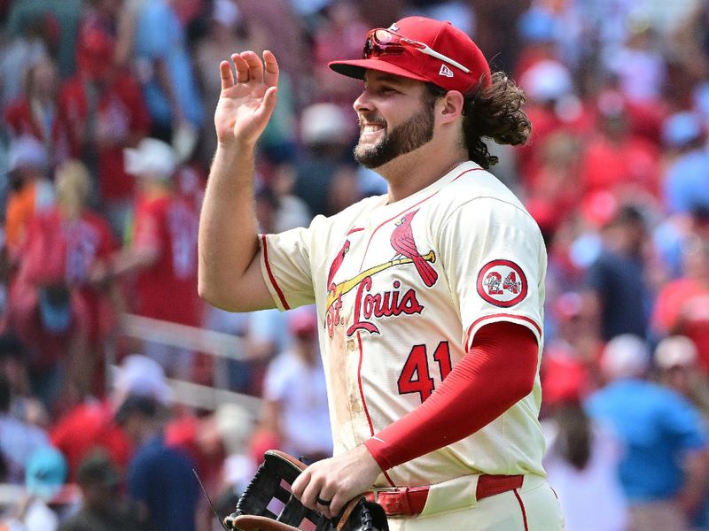 Jun 22, 2024; St. Louis, Missouri, USA;  St. Louis Cardinals outfielder Alec Burleson (41) congratulates teammates after the last out. He hit two home runs during the game against the San Francisco Giants at Busch Stadium. Mandatory Credit: Tim Vizer-USA TODAY Sports