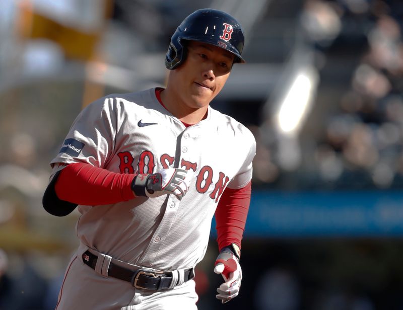 Apr 20, 2024; Pittsburgh, Pennsylvania, USA;  Boston Red Sox designated hitter  Masataka Yoshida (7) circles the bases on a two run home run against he Pittsburgh Pirates during the sixth inning at PNC Park. Mandatory Credit: Charles LeClaire-USA TODAY Sports