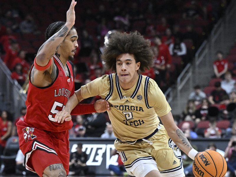 Feb 10, 2024; Louisville, Kentucky, USA; Georgia Tech Yellow Jackets guard Naithan George (2) dribbles against Louisville Cardinals guard Skyy Clark (55) during the first half at KFC Yum! Center. Mandatory Credit: Jamie Rhodes-USA TODAY Sports