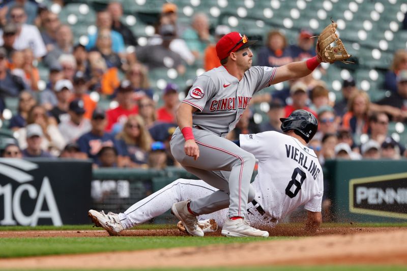 Sep 14, 2023; Detroit, Michigan, USA; Detroit Tigers right fielder Matt Vierling (8) slides in safe at third ahead of the throw to Cincinnati Reds first baseman Spencer Steer (7) in the first inning at Comerica Park. Mandatory Credit: Rick Osentoski-USA TODAY Sports