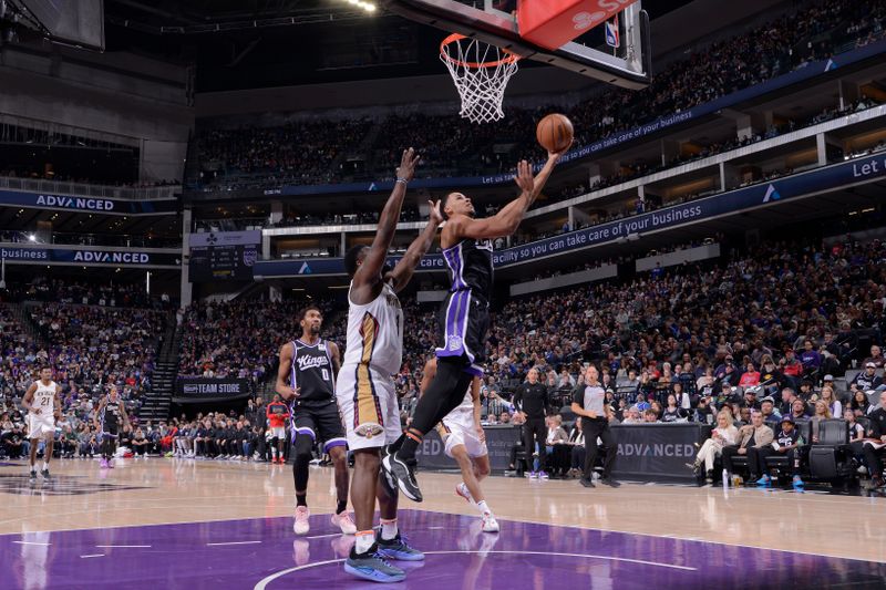 SACRAMENTO, CA - FEBRUARY 8:  Keegan Murray #13 of the Sacramento Kings drives to the basket during the game against the New Orleans Pelicans on February 8, 2025 at Golden 1 Center in Sacramento, California. NOTE TO USER: User expressly acknowledges and agrees that, by downloading and or using this Photograph, user is consenting to the terms and conditions of the Getty Images License Agreement. Mandatory Copyright Notice: Copyright 2025 NBAE (Photo by Rocky Widner/NBAE via Getty Images)