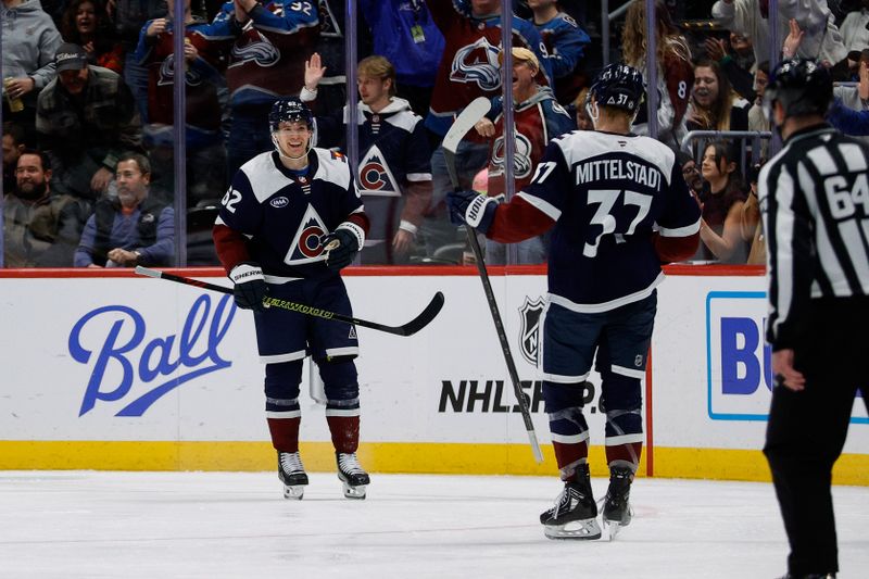 Jan 18, 2025; Denver, Colorado, USA; Colorado Avalanche left wing Artturi Lehkonen (62) celebrates his goal with center Casey Mittelstadt (37) in the third period against the Dallas Stars at Ball Arena. Mandatory Credit: Isaiah J. Downing-Imagn Images