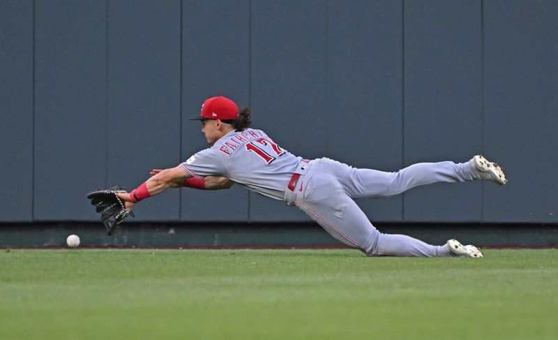 Jun 14, 2023; Kansas City, Missouri, USA;  Cincinnati Reds left fielder Stuart Fairchild (17) dives for the ball in the third inning against the Kansas City Royals at Kauffman Stadium. Mandatory Credit: Peter Aiken-USA TODAY Sports