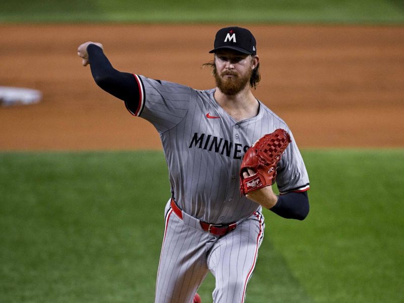 Aug 15, 2024; Arlington, Texas, USA; Minnesota Twins starting pitcher Bailey Ober (17) pitches against the Texas Rangers during the first inning at Globe Life Field. Mandatory Credit: Jerome Miron-USA TODAY Sports