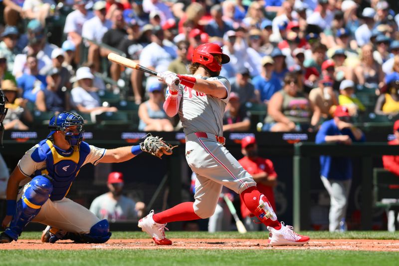Aug 4, 2024; Seattle, Washington, USA; Philadelphia Phillies first baseman Bryce Harper (3) hits a single against the Seattle Mariners during the fourth inning at T-Mobile Park. Mandatory Credit: Steven Bisig-USA TODAY Sports