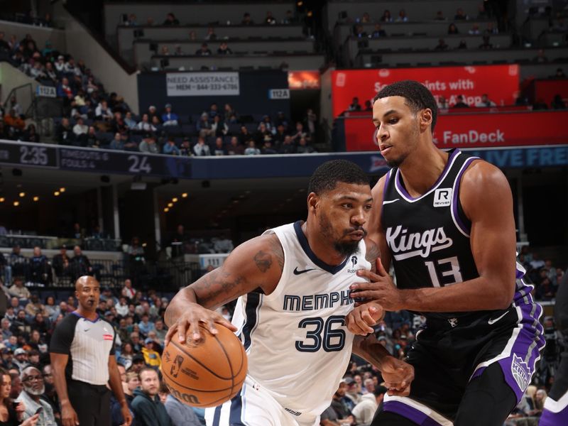 MEMPHIS, TN - DECEMBER 5: Marcus Smart #36 of the Memphis Grizzlies drives to the basket during the game against the Sacramento Kings on December 5, 2024 at FedExForum in Memphis, Tennessee. NOTE TO USER: User expressly acknowledges and agrees that, by downloading and or using this photograph, User is consenting to the terms and conditions of the Getty Images License Agreement. Mandatory Copyright Notice: Copyright 2024 NBAE (Photo by Joe Murphy/NBAE via Getty Images)