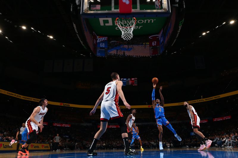 OKLAHOMA CITY, OK - MARCH 8:  Shai Gilgeous-Alexander #2 of the Oklahoma City Thunder drives to the basket during the game against the Miami Heat on March 8, 2024 at Paycom Arena in Oklahoma City, Oklahoma. NOTE TO USER: User expressly acknowledges and agrees that, by downloading and or using this photograph, User is consenting to the terms and conditions of the Getty Images License Agreement. Mandatory Copyright Notice: Copyright 2024 NBAE (Photo by Zach Beeker/NBAE via Getty Images)