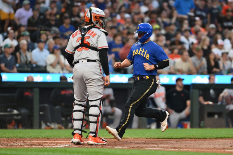 Aug 11, 2023; Seattle, Washington, USA; Seattle Mariners first baseman Ty France (23) scores a run against the Baltimore Orioles during the fourth inning at T-Mobile Park. Mandatory Credit: Steven Bisig-USA TODAY Sports